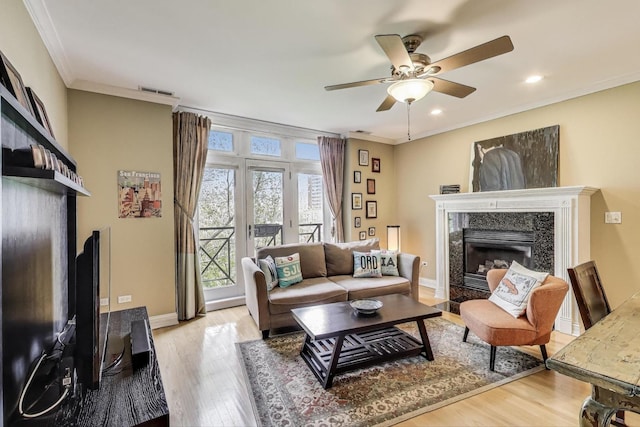 4860 N Kenmore Ave Unit 4S, Chicago, IL 60640 - living room featuring a fireplace, a ceiling fan, wood finished floors, ornamental molding, and recessed lighting