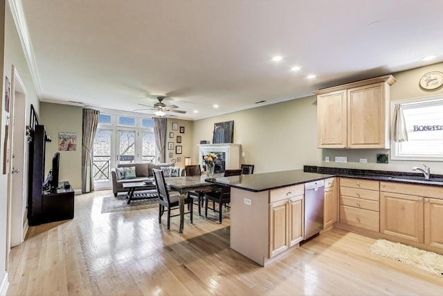 4860 N Kenmore Ave Unit 4S, Chicago, IL 60640 - kitchen featuring light brown cabinets, dishwasher, a sink, a peninsula, and crown molding