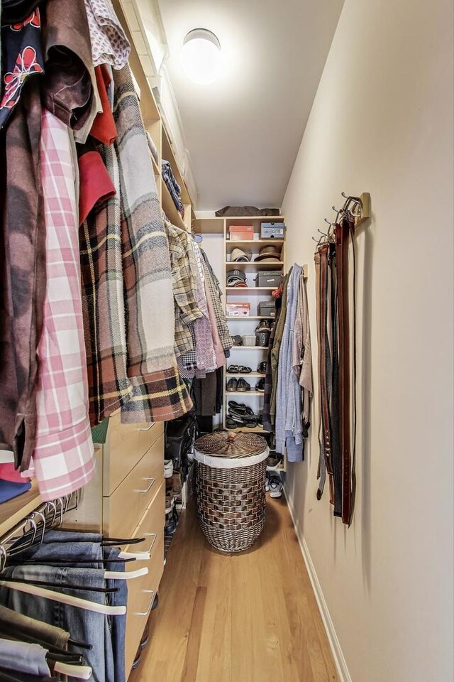 4860 N Kenmore Ave Unit 4S, Chicago, IL 60640 - walk in closet with wood finished floors