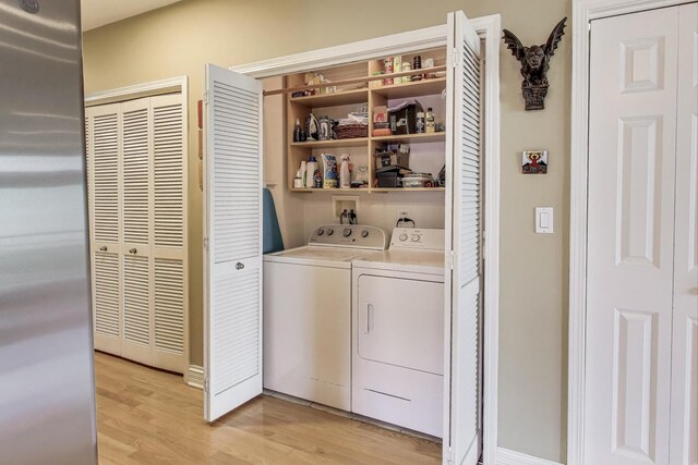 4860 N Kenmore Ave Unit 4S, Chicago, IL 60640 - washroom featuring washer and dryer and light wood-type flooring