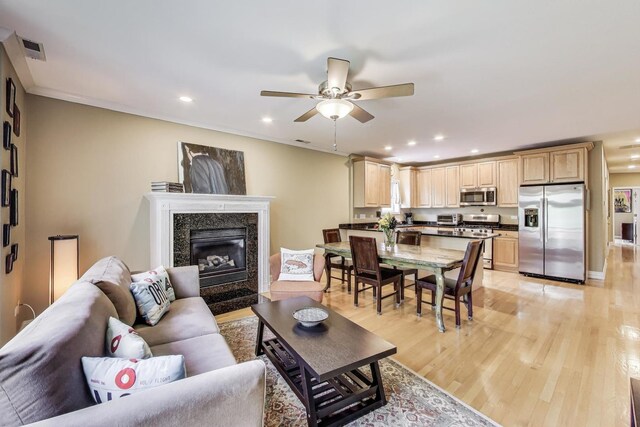 4860 N Kenmore Ave Unit 4S, Chicago, IL 60640 - living area featuring ceiling fan, light wood finished floors, recessed lighting, and a premium fireplace