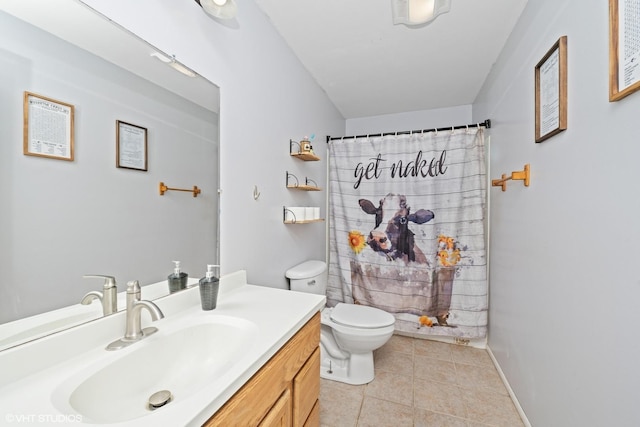full bathroom featuring toilet, tile patterned floors, vanity, and a shower with shower curtain