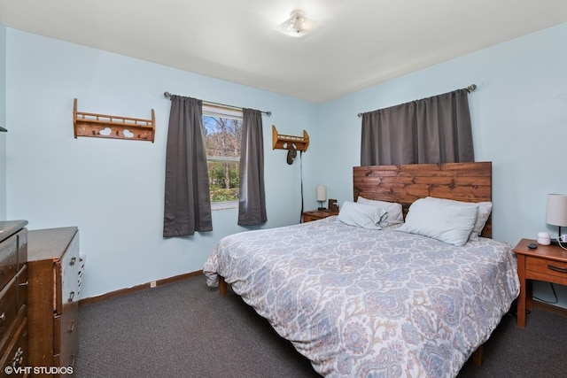carpeted bedroom with baseboards