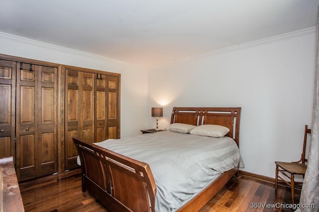 304 Polo Ln, Oak Brook, IL 60523 - bedroom with dark wood-type flooring, ornamental molding, and baseboards