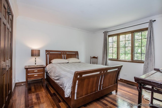304 Polo Ln, Oak Brook, IL 60523 - bedroom featuring dark wood finished floors, baseboards, and ornamental molding