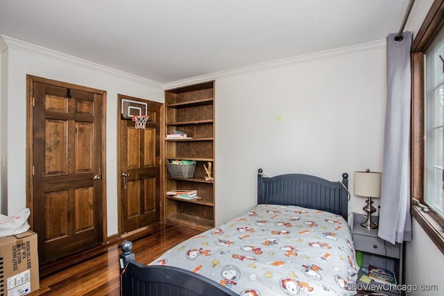 304 Polo Ln, Oak Brook, IL 60523 - bedroom featuring dark wood-style flooring and crown molding