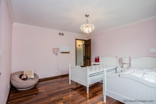 304 Polo Ln, Oak Brook, IL 60523 - bedroom with a chandelier, wood finished floors, crown molding, and baseboards