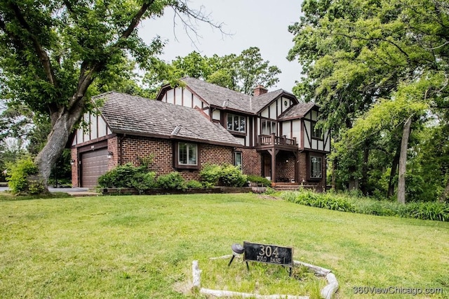 304 Polo Ln, Oak Brook, IL 60523 - tudor home featuring brick siding, a balcony, a garage, a front lawn, and a chimney
