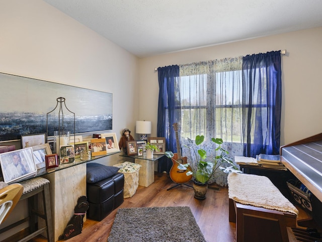 home office with wood finished floors