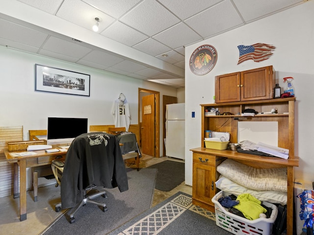 office space with a drop ceiling
