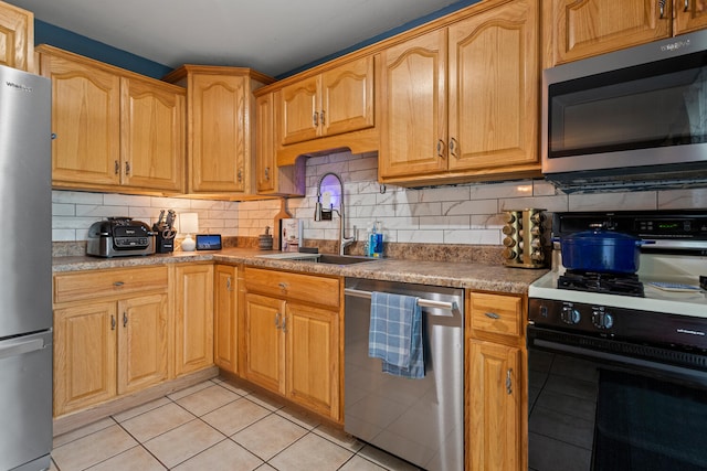 1407 Centennial Dr, Champaign, IL 61821 - kitchen with stainless steel appliances, tasteful backsplash, and light tile patterned floors