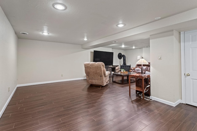 1407 Centennial Dr, Champaign, IL 61821 - office space featuring a wood stove, dark wood-style flooring, and recessed lighting