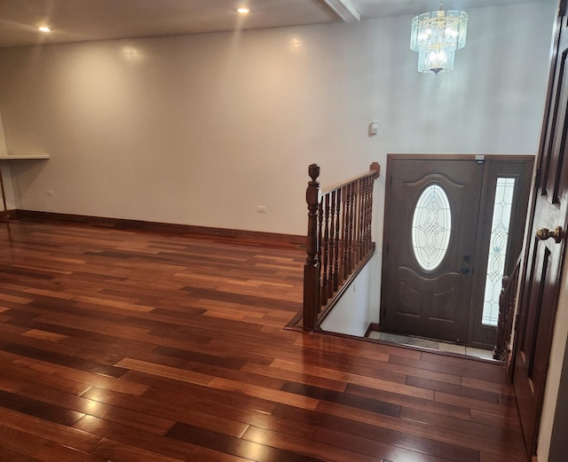 11723 S S Ave J, Chicago, IL 60617 - entryway featuring a chandelier, dark wood-style floors, and baseboards