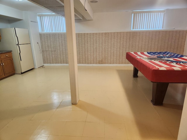 11723 S S Ave J, Chicago, IL 60617 - rec room with wallpapered walls, baseboards, and a wainscoted wall