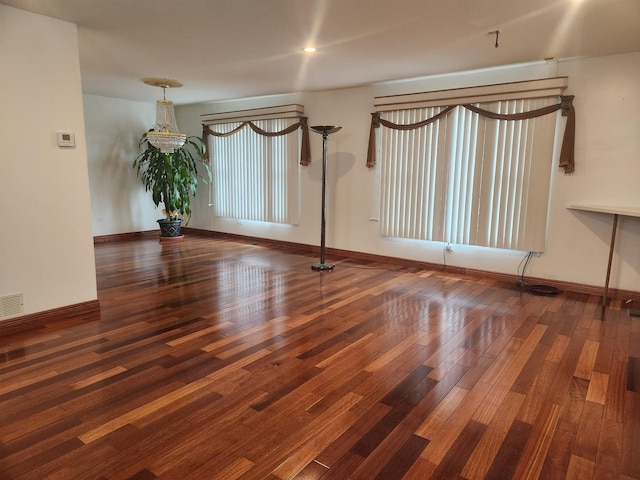 11723 S S Ave J, Chicago, IL 60617 - empty room featuring wood finished floors, baseboards, and visible vents