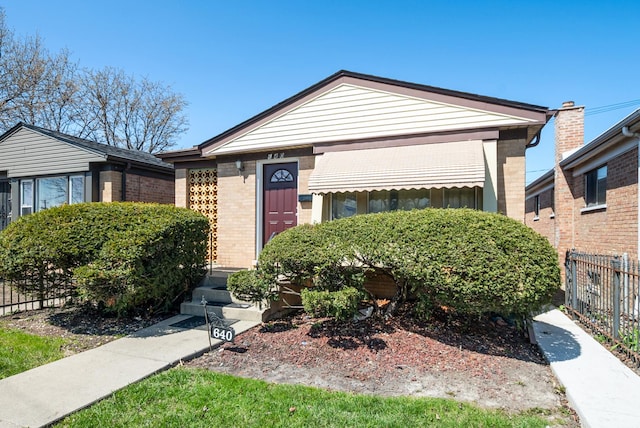 640 W 95th St, Chicago, IL 60628 - view of front facade featuring brick siding and fence