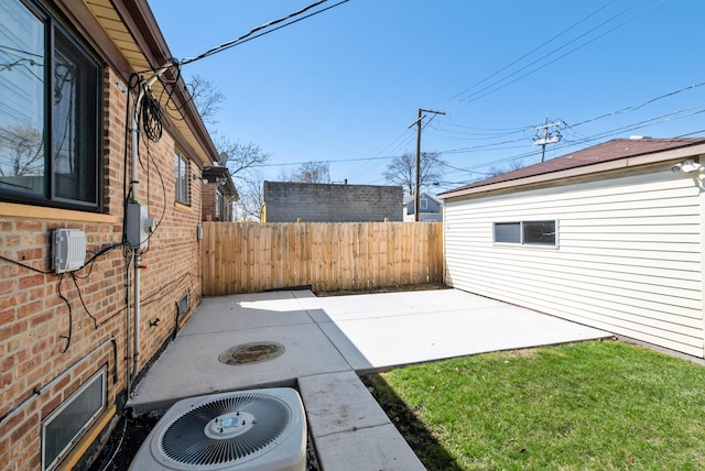640 W 95th St, Chicago, IL 60628 - view of patio / terrace featuring central AC and fence