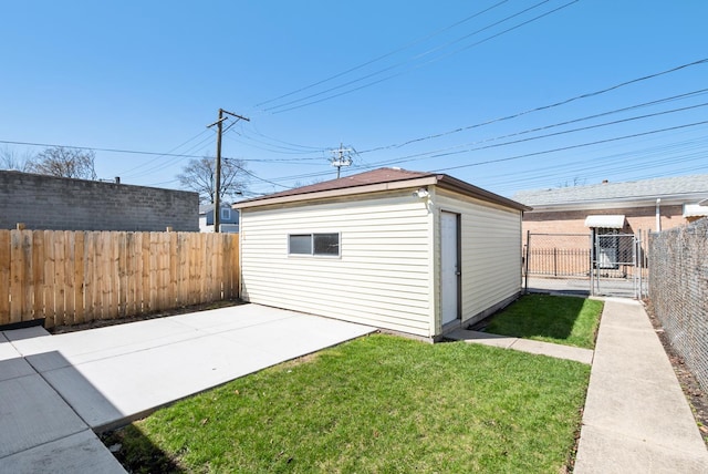640 W 95th St, Chicago, IL 60628 - view of outdoor structure with fence private yard, an outdoor structure, and a gate