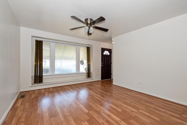 640 W 95th St, Chicago, IL 60628 - interior space with visible vents, baseboards, light wood-type flooring, and a ceiling fan