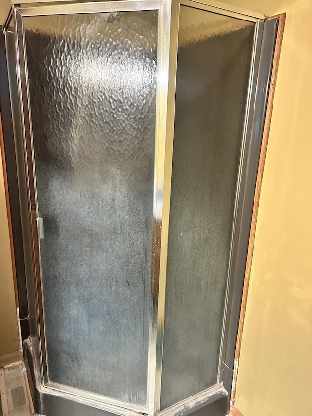 bathroom featuring a stall shower