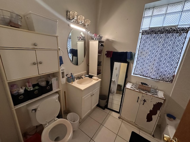 1842 S Drake Ave, Chicago, IL 60623 - bathroom featuring toilet, tile patterned flooring, and vanity