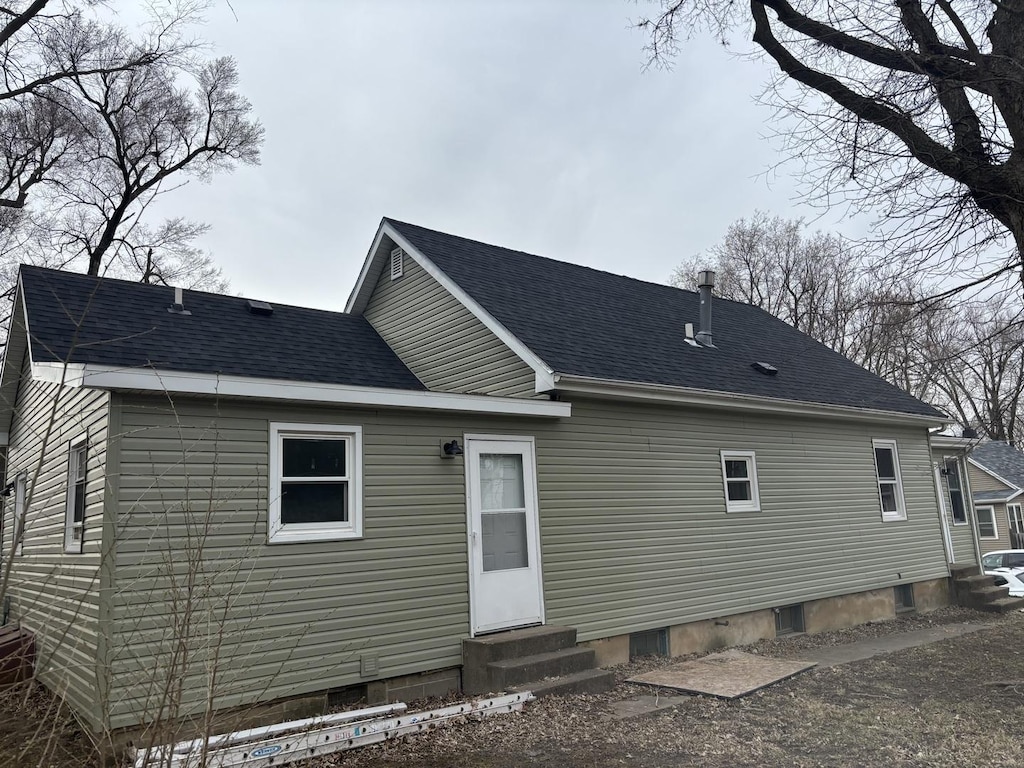 1308 W Taylor St, Bloomington, IL 61701 - rear view of house featuring entry steps and a shingled roof