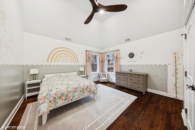bedroom featuring baseboards, wood finished floors, visible vents, and ceiling fan