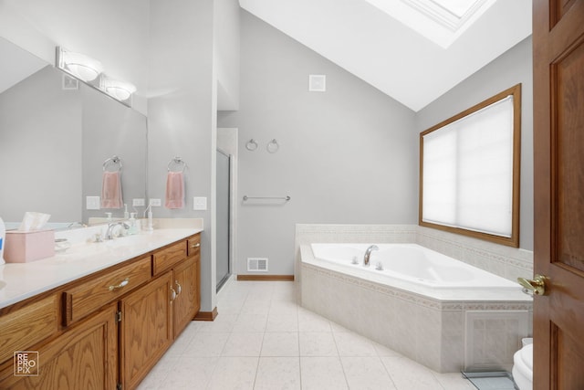 5324 Switch Grass Ln, Naperville, IL 60564 - bathroom with tile patterned floors, a skylight, visible vents, a garden tub, and a stall shower