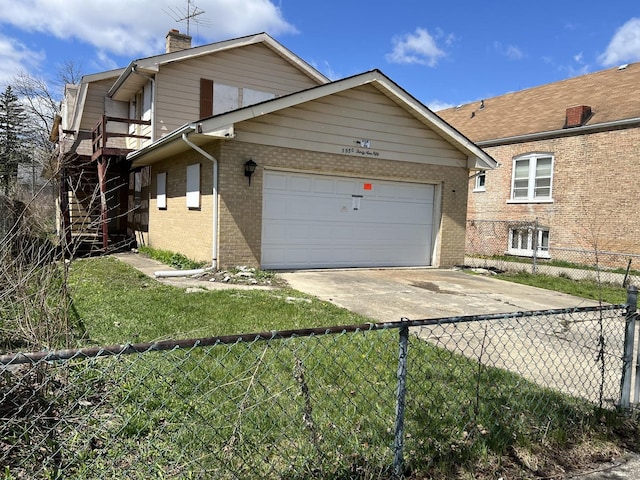 view of front of house with fence, brick siding, an attached garage, a chimney, and concrete driveway