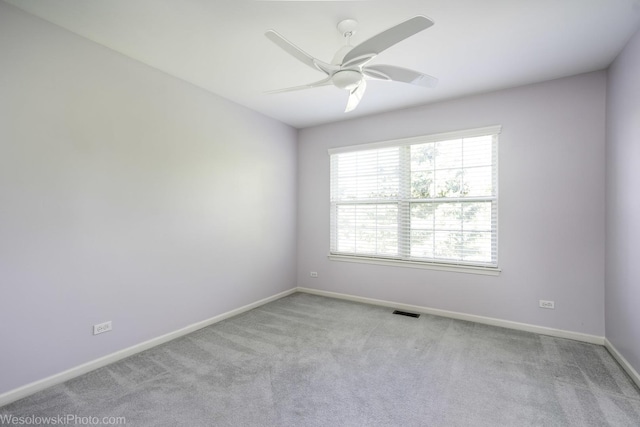 418 Bay Tree Cir, Vernon Hills, IL 60061 - spare room featuring a ceiling fan, carpet flooring, and baseboards