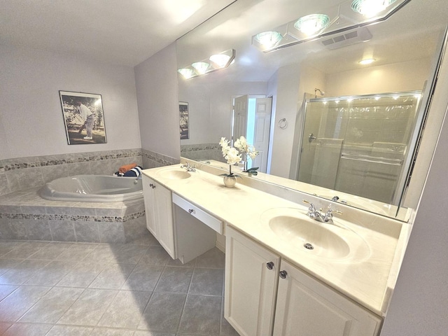 418 Bay Tree Cir, Vernon Hills, IL 60061 - bathroom featuring tile patterned floors, a shower stall, a bath, and double vanity