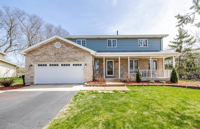 8001 William Dr, Willowbrook, IL 60527 - traditional home featuring driveway, an attached garage, a front yard, brick siding, and a porch