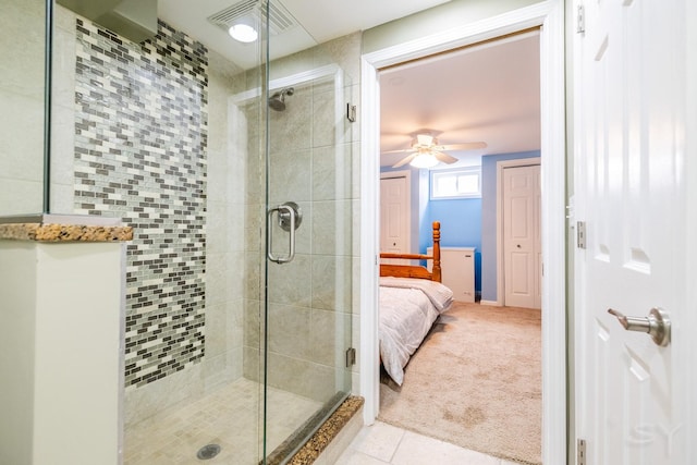 8001 William Dr, Willowbrook, IL 60527 - full bathroom featuring ceiling fan, ensuite bath, visible vents, a stall shower, and tile patterned floors