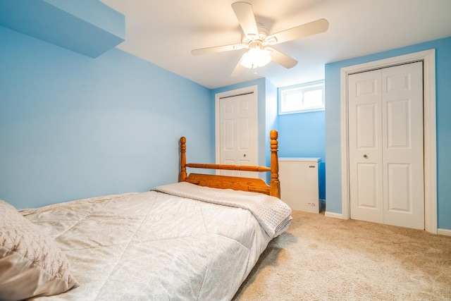 8001 William Dr, Willowbrook, IL 60527 - carpeted bedroom with two closets and a ceiling fan