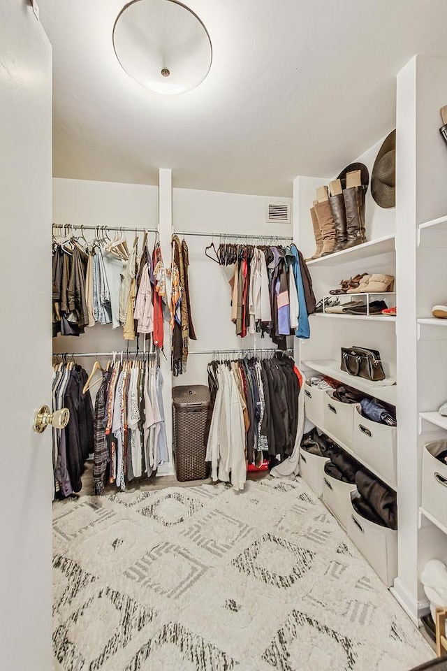 walk in closet featuring visible vents