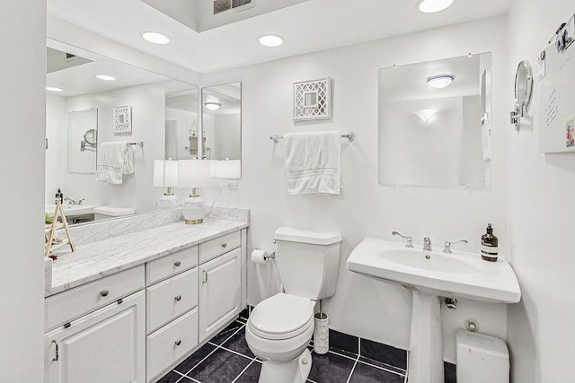 bathroom with recessed lighting, tile patterned flooring, toilet, and visible vents