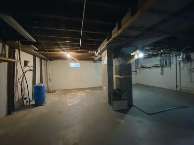 basement featuring electric panel