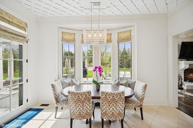 494 Sheridan Rd, Glencoe, IL 60022 - dining space with baseboards, a notable chandelier, and plenty of natural light