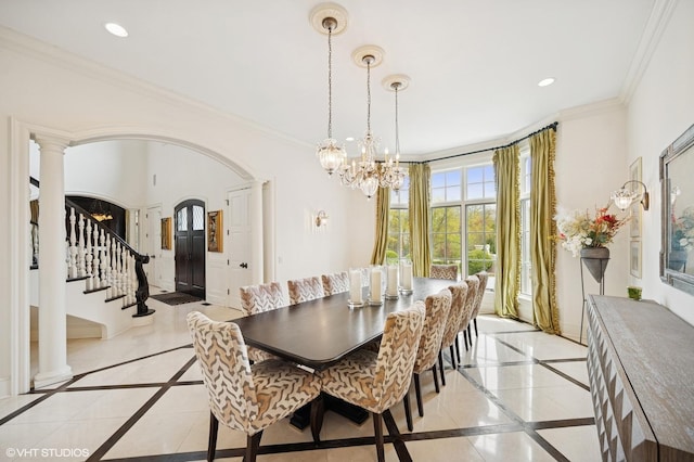 494 Sheridan Rd, Glencoe, IL 60022 - dining area featuring arched walkways, an inviting chandelier, ornamental molding, and recessed lighting