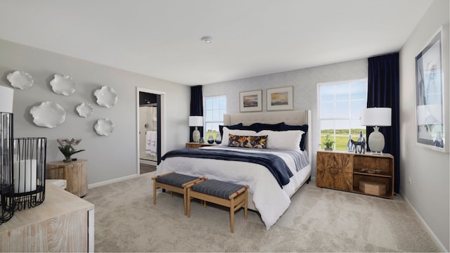 bedroom featuring carpet, ensuite bathroom, and baseboards