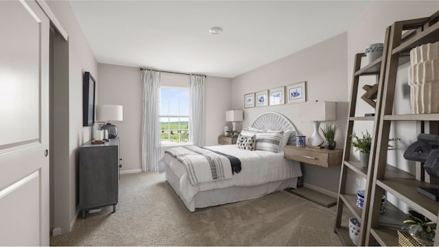 bedroom with baseboards and carpet floors