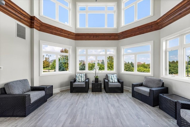 sunroom featuring visible vents