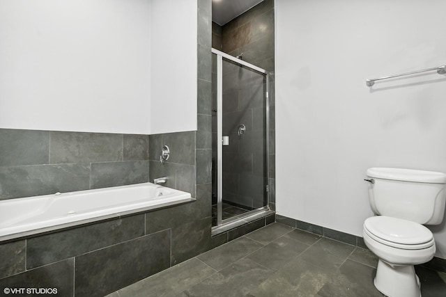 full bath with a garden tub, baseboards, toilet, and a shower stall