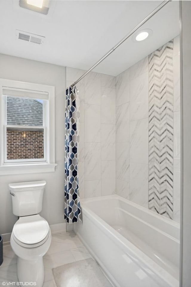 full bathroom with toilet, shower / bath combination with curtain, marble finish floor, baseboards, and visible vents