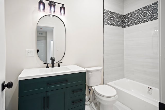 bathroom featuring visible vents, toilet, vanity, and shower / bathtub combination