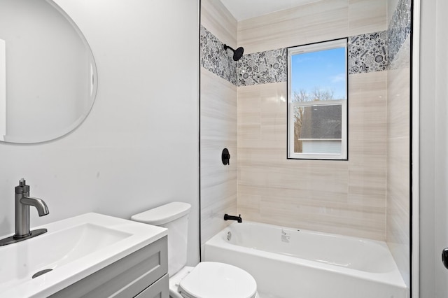 bathroom featuring shower / bath combination, vanity, and toilet