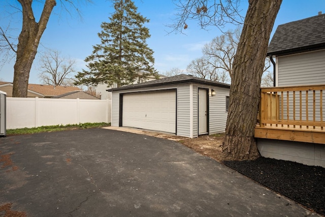 detached garage with fence