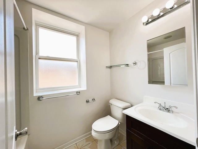 3436 S Wallace St, Chicago, IL 60616 - full bathroom with walk in shower, toilet, vanity, tile patterned flooring, and baseboards