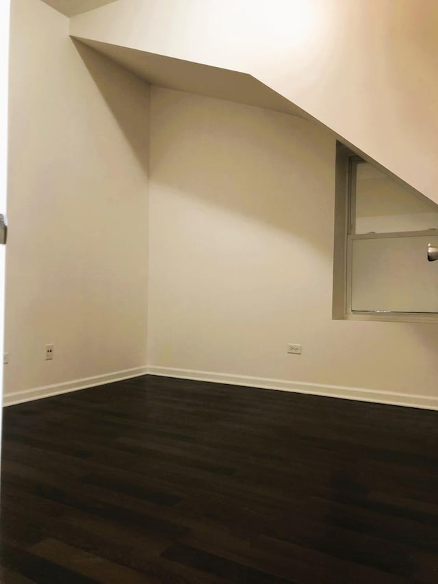 3436 S Wallace St, Chicago, IL 60616 - bonus room featuring baseboards and dark wood-style floors