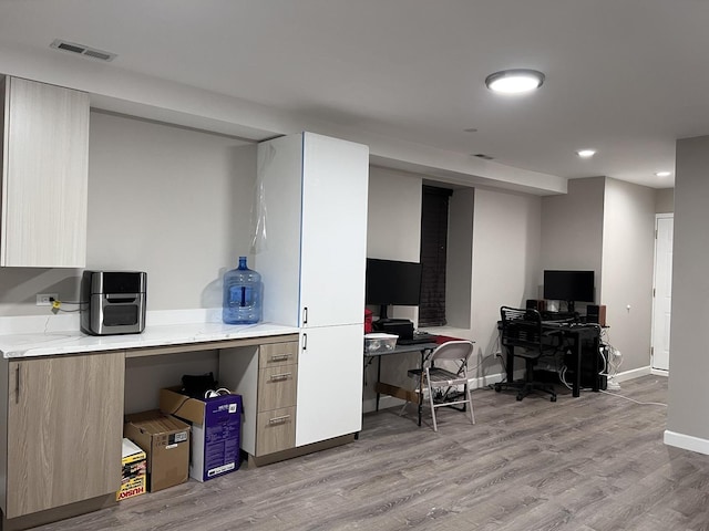 3436 S Wallace St, Chicago, IL 60616 - office area with light wood-style floors, visible vents, baseboards, and recessed lighting